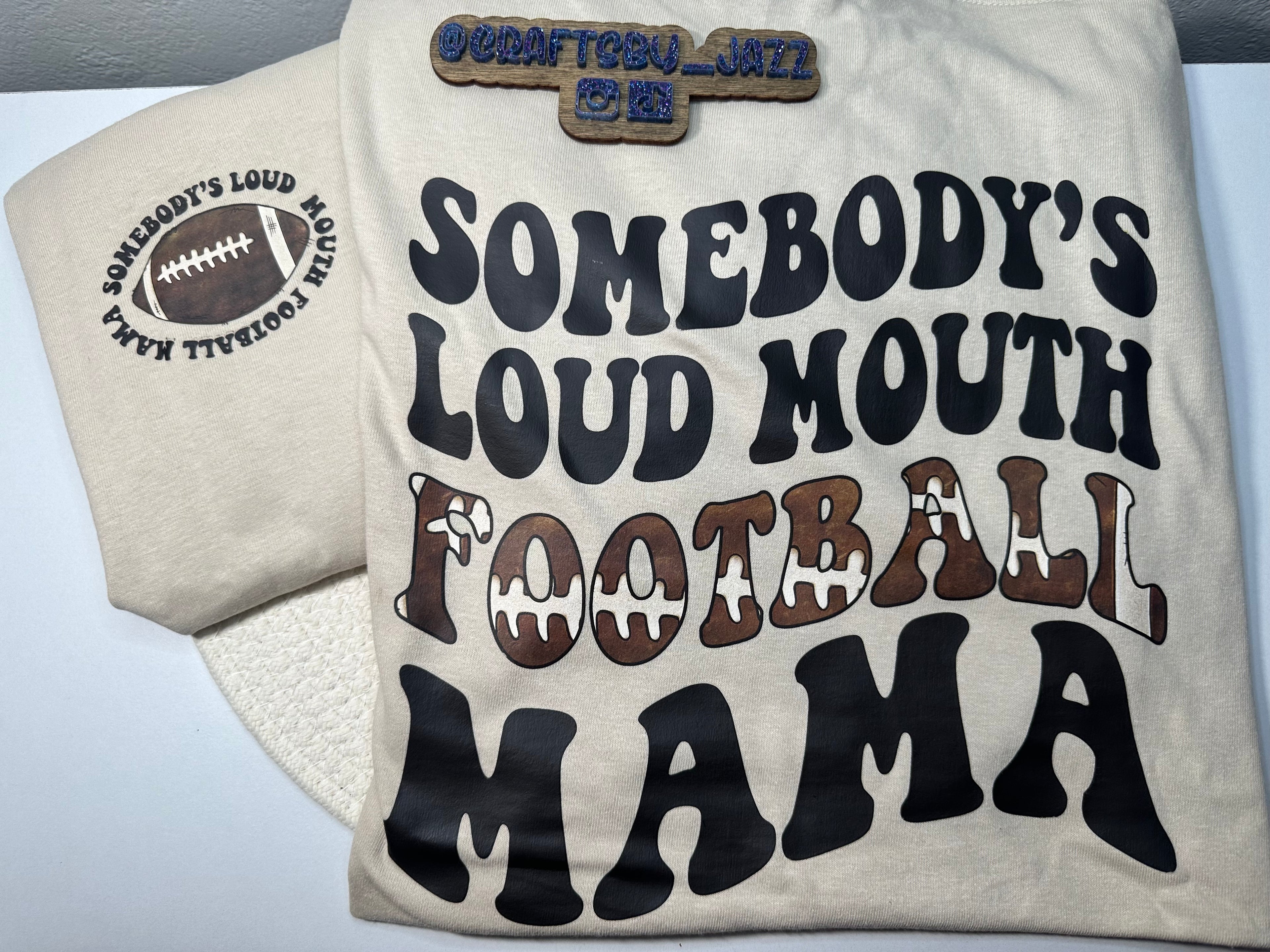Somebody’s Loud Mouth Football Mama Tshirt
